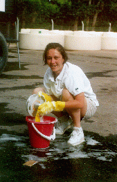 03 - Stephanie washing parts of the water truck