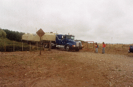 1.29 - Truck loaded with 4 tanks at the El Chacay gate
