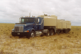 1.31 - Truck loaded with 4 tanks in the middle of the pampa
